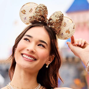 ディズニー アナハイムパーク 70周年記念 ミニーマウス カチューシャ耳 ゴールド スパンコール リボン Disney